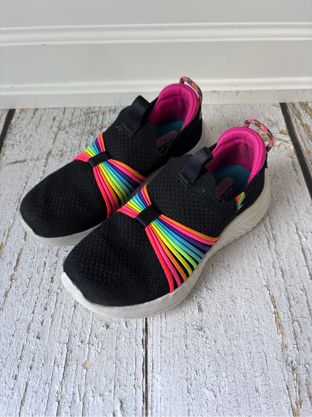 Skechers Kids Black Slip-On Sneakers with Rainbow Straps and Pink Lining